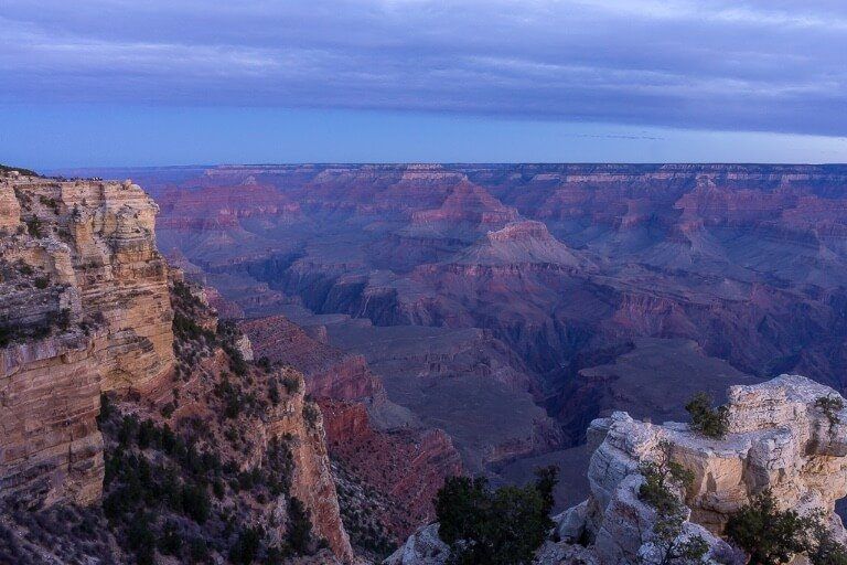 Mather Point from along the Rim with purple canyon rocks and clouds