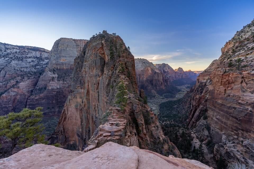 Stunning wide angle photo of Angels Landing at sunrise from half way up the trail before taking on the steep section