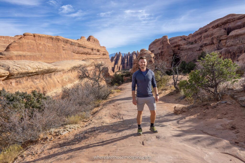 Hiker enjoying the off path trails in Arches national park Utah