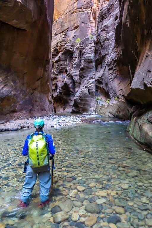 Kristen where are those morgans wearing neoprene pants and socks with canyoneering boots and waterproof bag from zion outfitter hiking through zion the narrows incredible trail