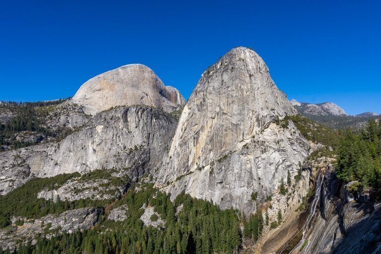 Liberty Cap and Half Dome in the background with Nevada Falls to the right