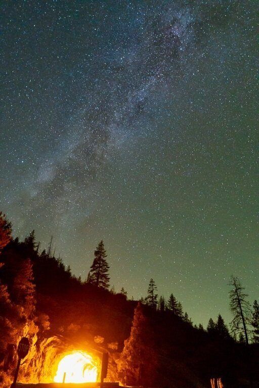 Tunnel view yosemite national park astrophotography star photograph with orange glow from tunnel milky way