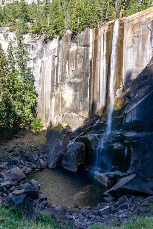 Vernal falls running dry into a plunge pool surrounded by rocks yosemite national park photography