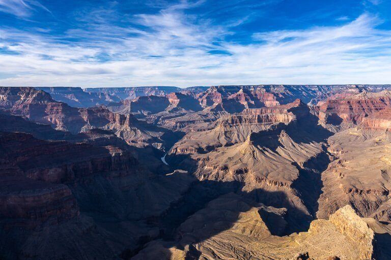 Pima Point view into the grand canyon before sunset late afternoon shadows beginning to cast across the canyon