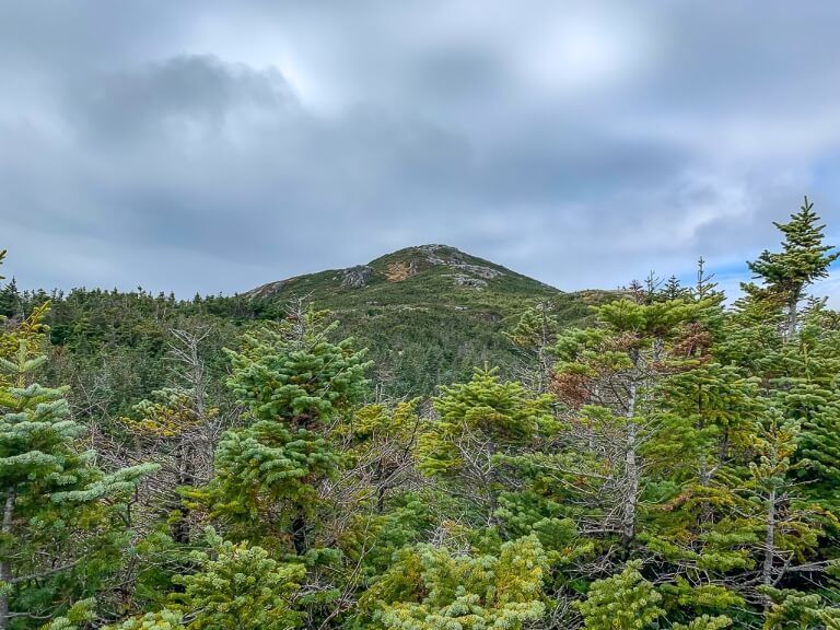 Summit of mount marcy from far below with clouds