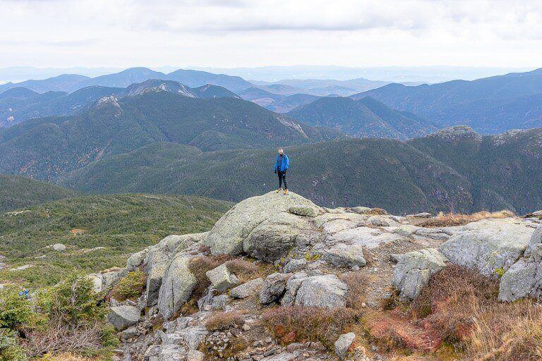 Awesome views at the summit of Mount Marcy hiking trail in adirondacks ny with rolling peak tops as far as the eye can see