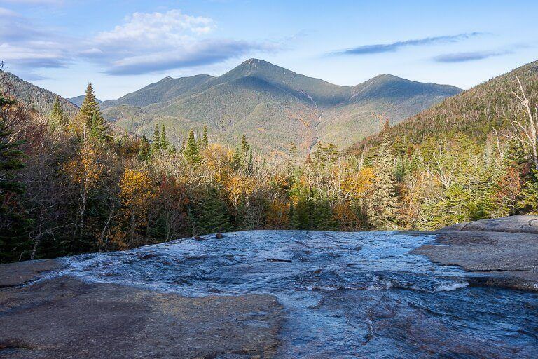 Indian Falls waterfall on the Mount Marcy hiking trail in lake placid adirondacks new york with stunning views of rolling hills