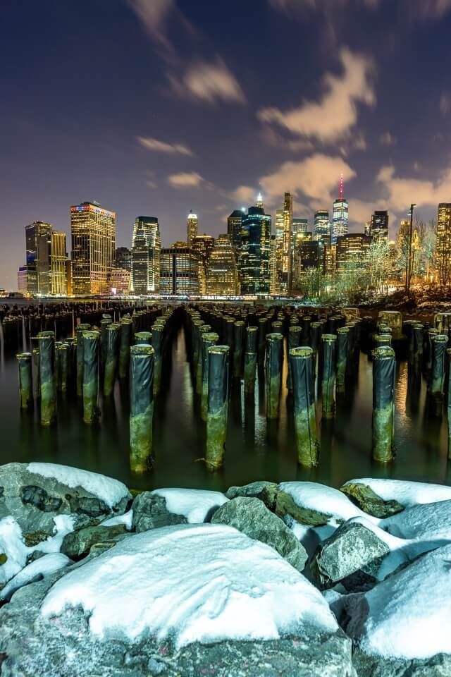 Old pier 1 new york city photography in winter with snow on rocks