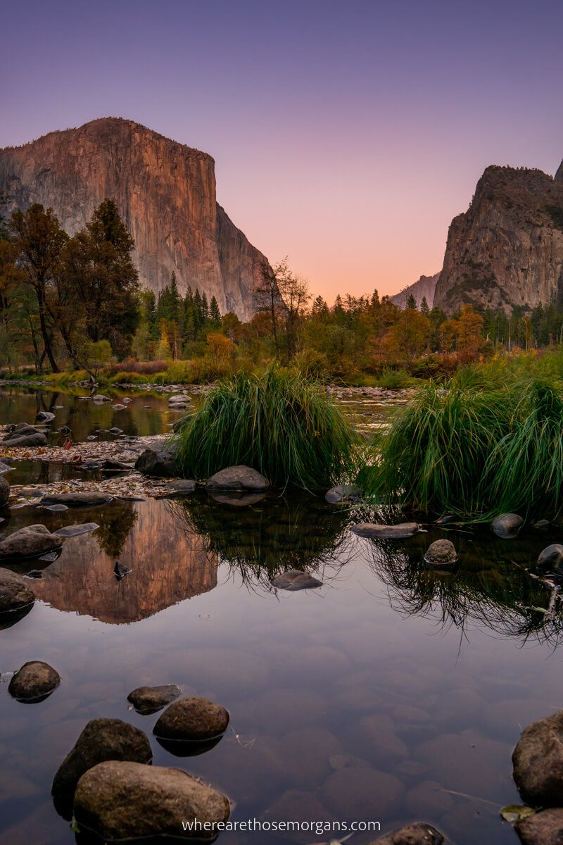 Yosemite Valley View at sunset stunning colors in the sky El Capitan lighting up and reflecting in Merced River