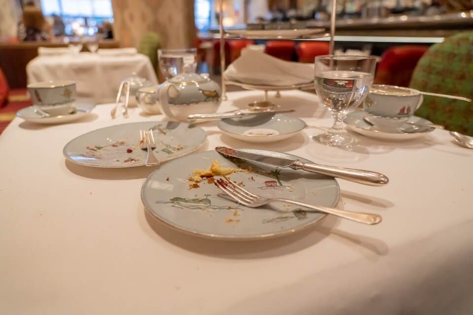 Empty plates with crumbs at a hotel in new york city