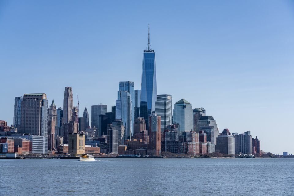 Lower Manhattan with one world trade center from circle line boat tour in Hudson River