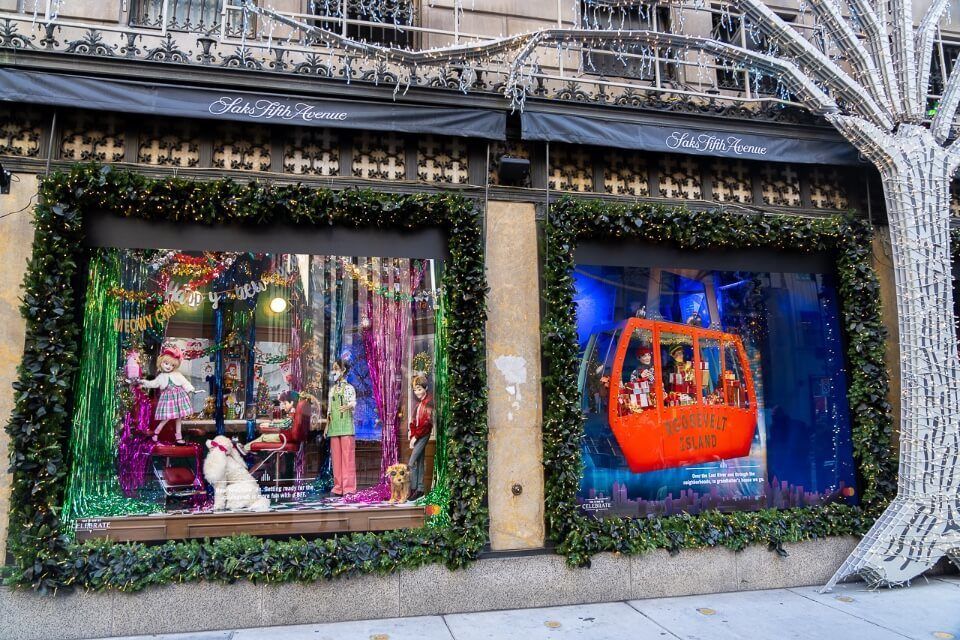 Saks fifth avenue at christmas displaying exhibits in window