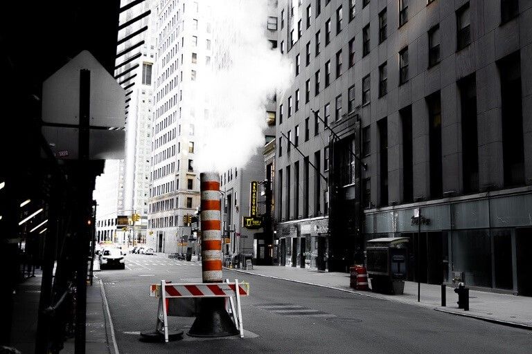 Smoke stack with steam coming out of subways in new york city makes for awesome and unique photography