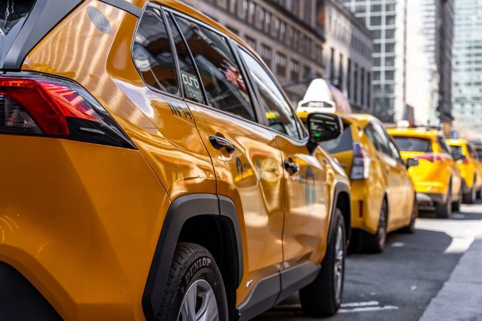 Classic and iconic yellow taxi photograph taken outside grand central station