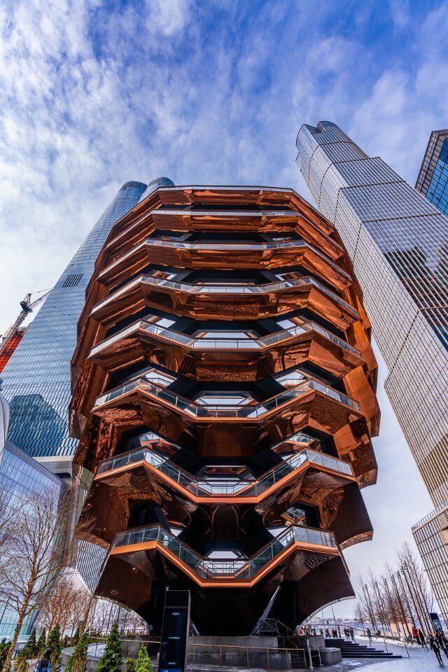 Vessel is among the best photography locations in NYC stunning architecture with tall buildings behind