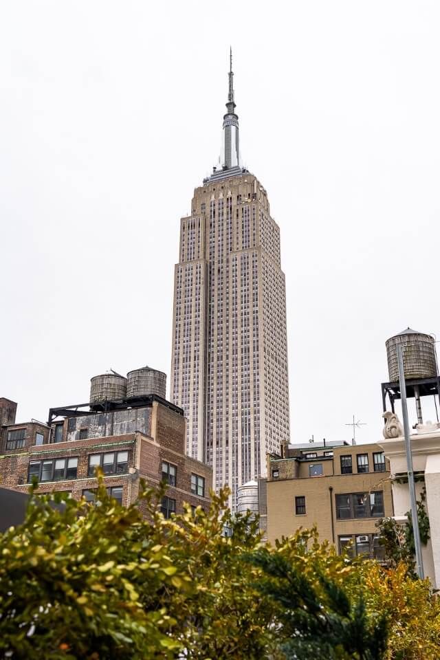 Empire state building from refinery rooftop bar in new york city