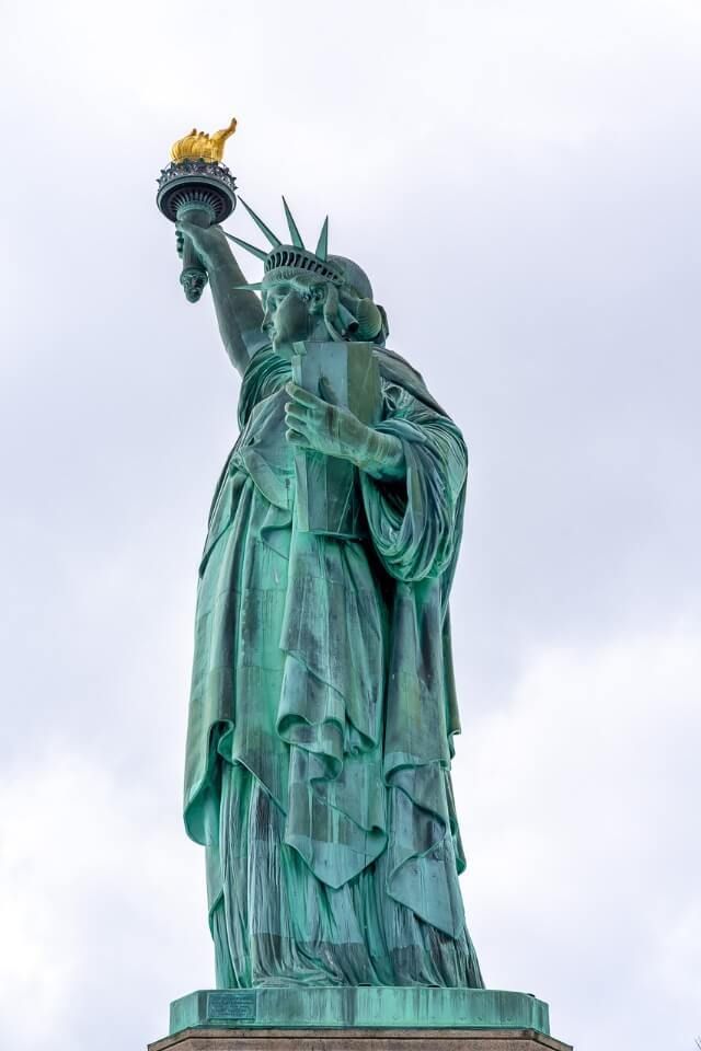 One of the very best things to do in New York City is take the ferry to statue of liberty on liberty island top bucket list attraction