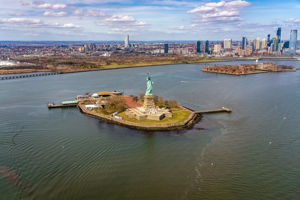 Statue of Liberty from above on a luxury tour over Manhattan