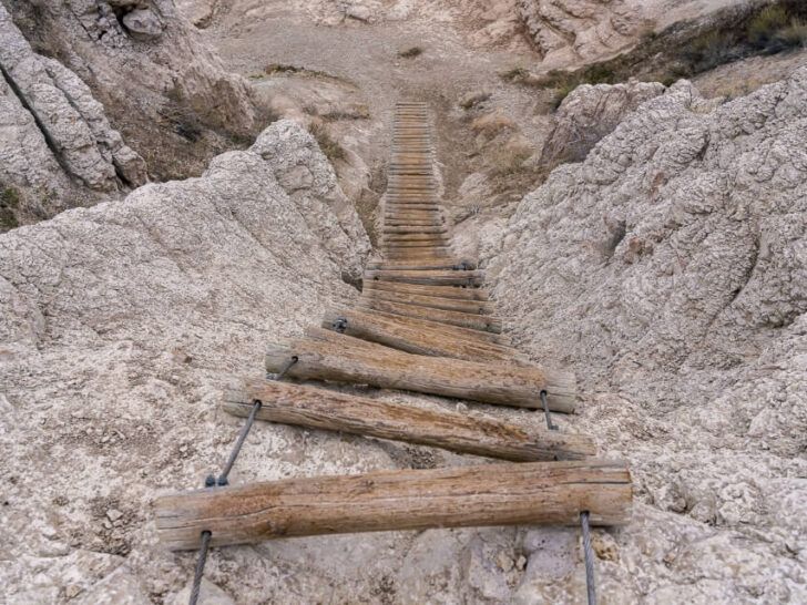 Empty wooden ladder on a rock face Notch Trail Badlands national park best hike where are those morgans