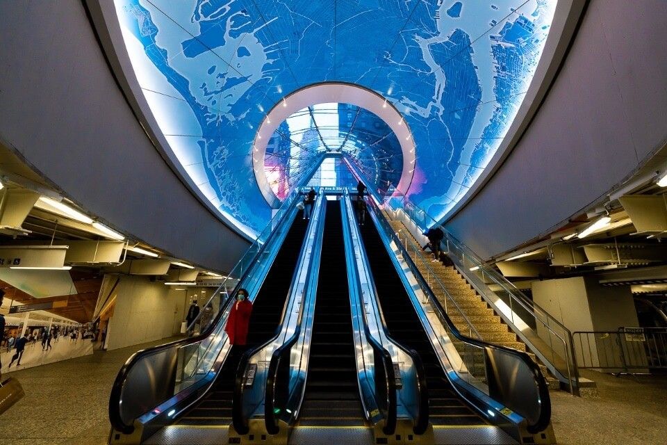 Penn Station globe escalator into station near 34th street