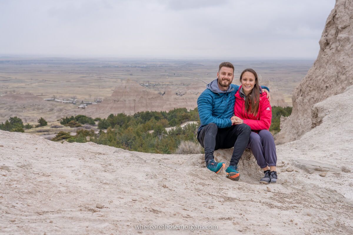 Mark and Kristen Morgan from Where Are Those Morgans at the summit viewpoint on notch trail in Badlands national park