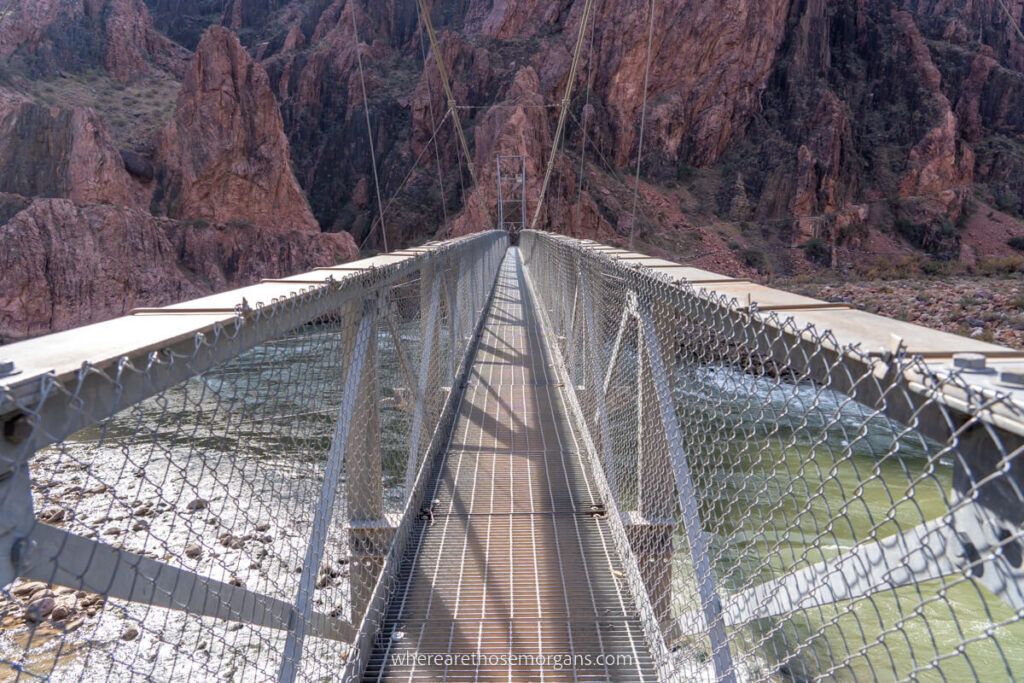 Bright Angel Bridge metal long and narrow suspension bridge crossing the Colorado River