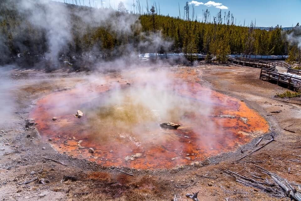 Echinus geyser norris geyser basin reds and oranges
