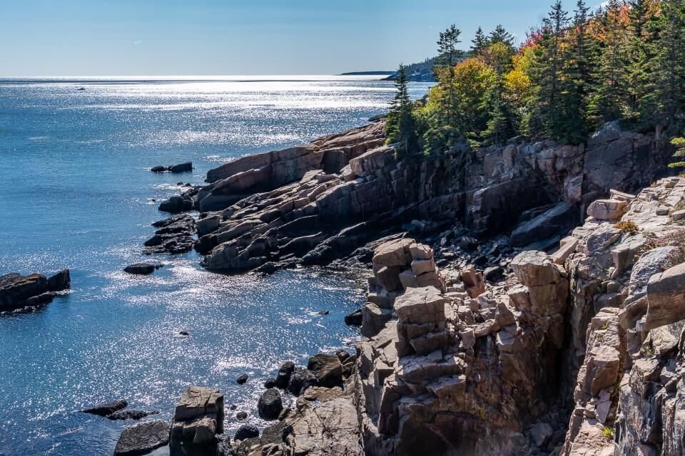 Ocean Path is a lovely calm relaxing trail to walk and one of the best family friendly things to do in acadia national park rocky headlands with colorful trees