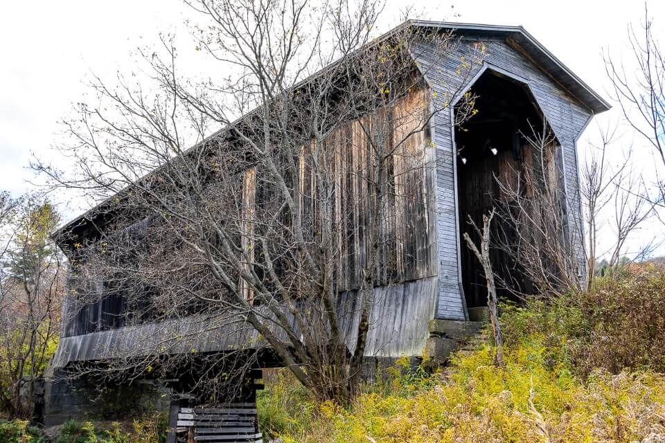 Fisher covered railroad bridge in Walcott new england wooden structure disused now
