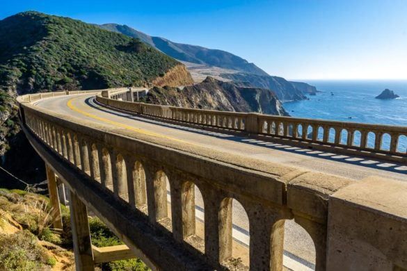 How to plan a road trip bridge crossing gorge on california pacific coast highway with blue sky and ocean road trip planning steps ultimate planner