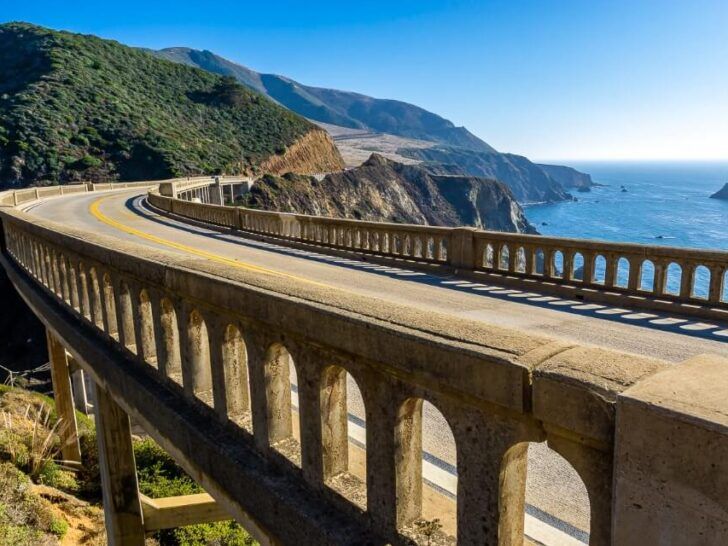 How to plan a road trip bridge crossing gorge on california pacific coast highway with blue sky and ocean road trip planning steps ultimate planner