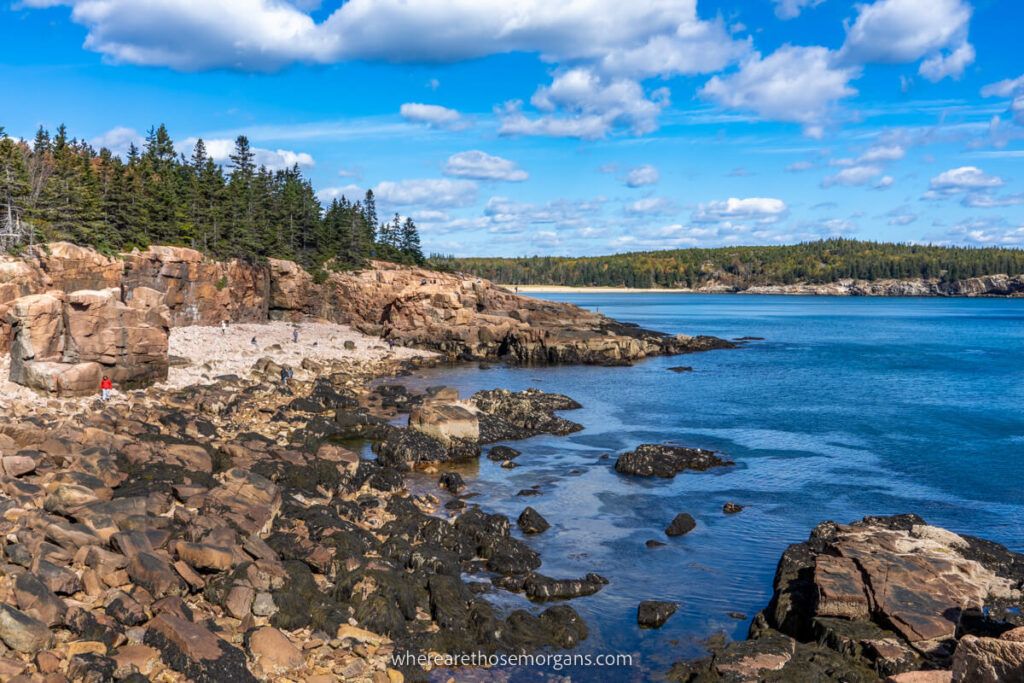 Coastline of Acadia national park in Maine with boulders and clouds in sky