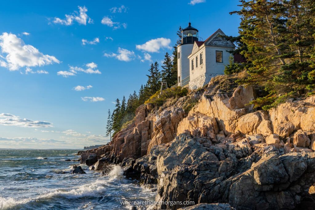 Bass Harbor Head Lighthouse in Acadia national park on a sunny late afternoon with blue sky