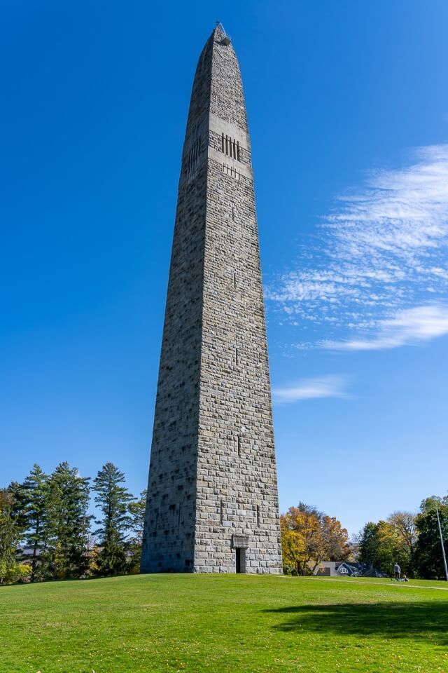 Bennington battle monument 300 ft tall obelisk on a grassy mound