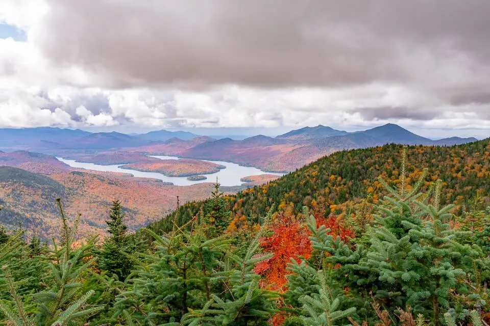 View over Lake Placid NY from Whiteface Mountain with clouds in sky