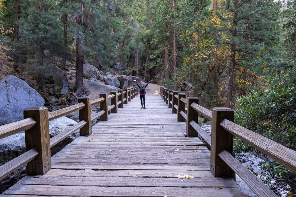 Hiking Mist Trail in Yosemite national park crossing bridge with no other people around lack of crowds makes october the perfect month to visit