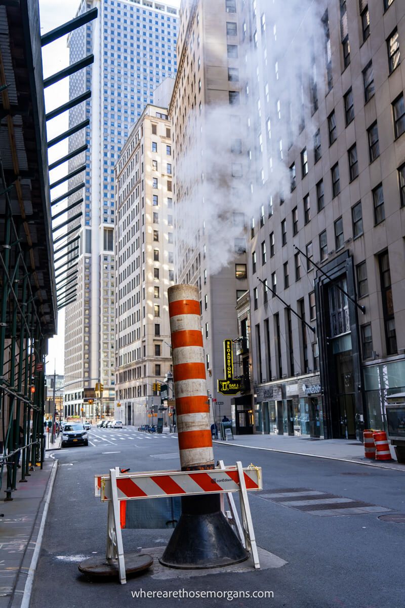 Red and white striped smoke stack on the road in New York City