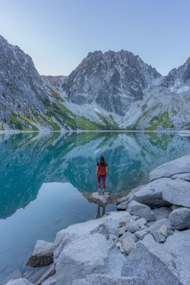 Kristen looking up at Aasgard Pass from Colchuck Lake