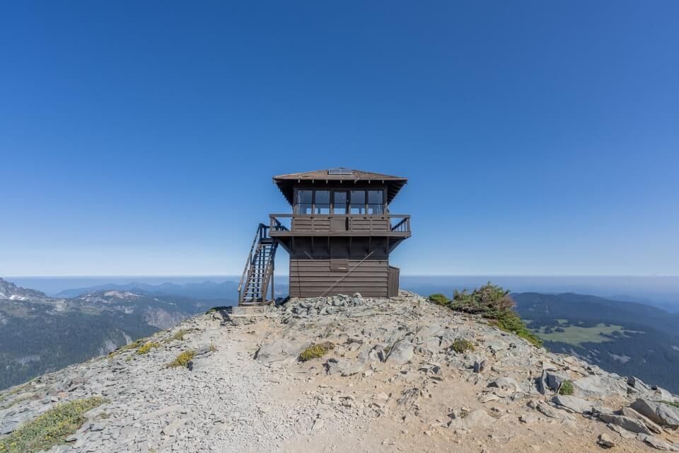 Mount Fremont fire lookout tower two tiered wooden structure with amazing view behind