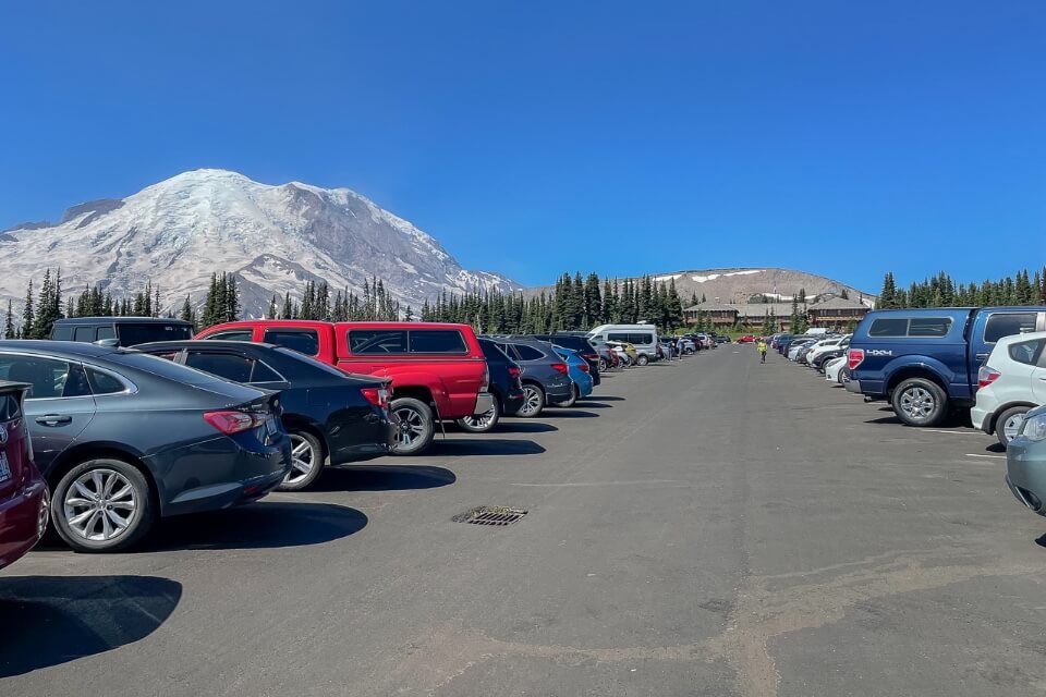 Parking lot in sunrise Mt Rainier national park july mid morning full on a bright day