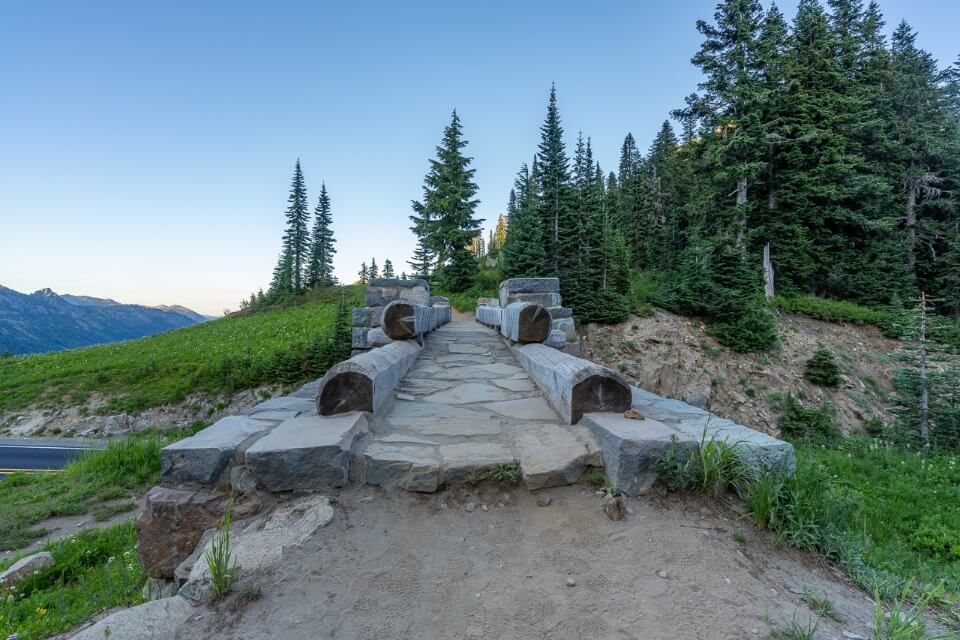 Stone and wooden bridge marks the end of a hike in washington