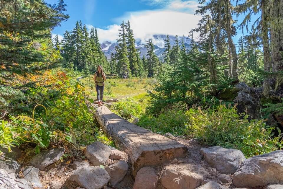 Spray Park trail mt rainier national park stunning meadows with mountain views and wooden bridge