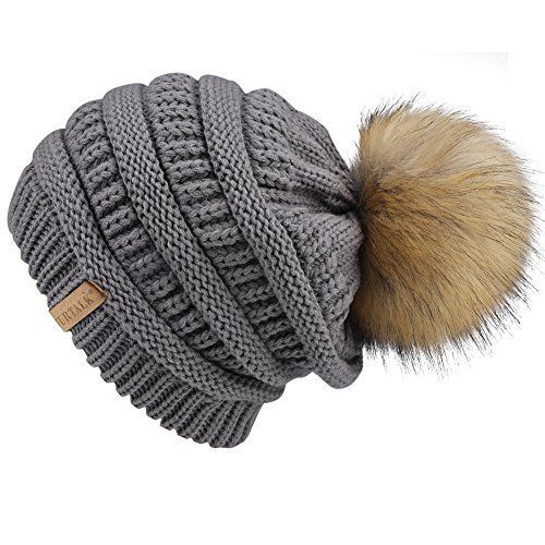 Comfortable beanie with pom on the back