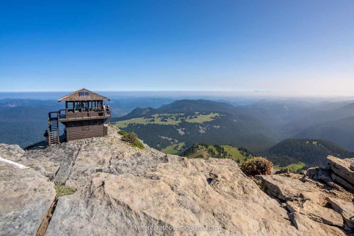 Mt Fremont Fire Lookout wide angle photo with rocks in foreground and a spectacular view to the horizon