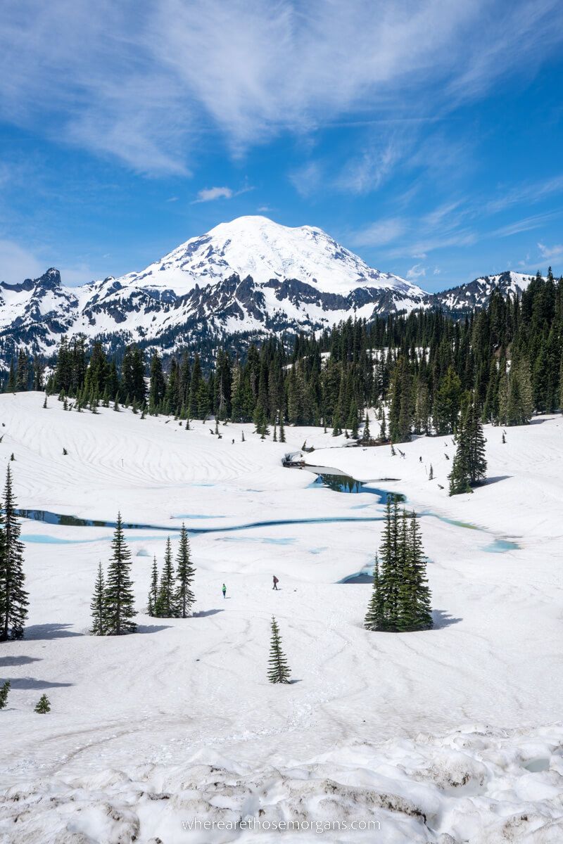 Mount Rainier National Park in June with Tipsoo Lake covered in snow