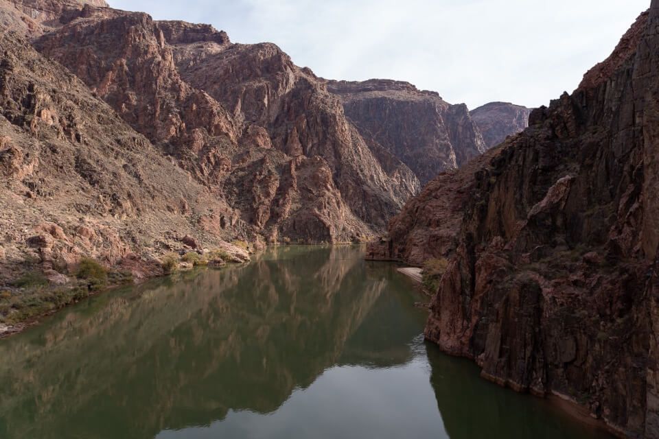 Colorado River still and reflecting rocks in northern arizona