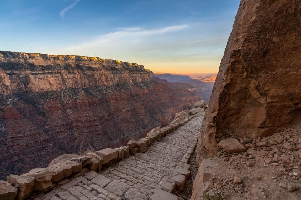 Hiking path at sunrise along grand canyon south rim close to the national park airport in Tusayan