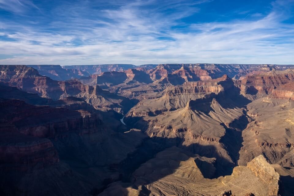 Dramatic views over grand canyon south rim from pima point with shadows and colorado river on a sunny day