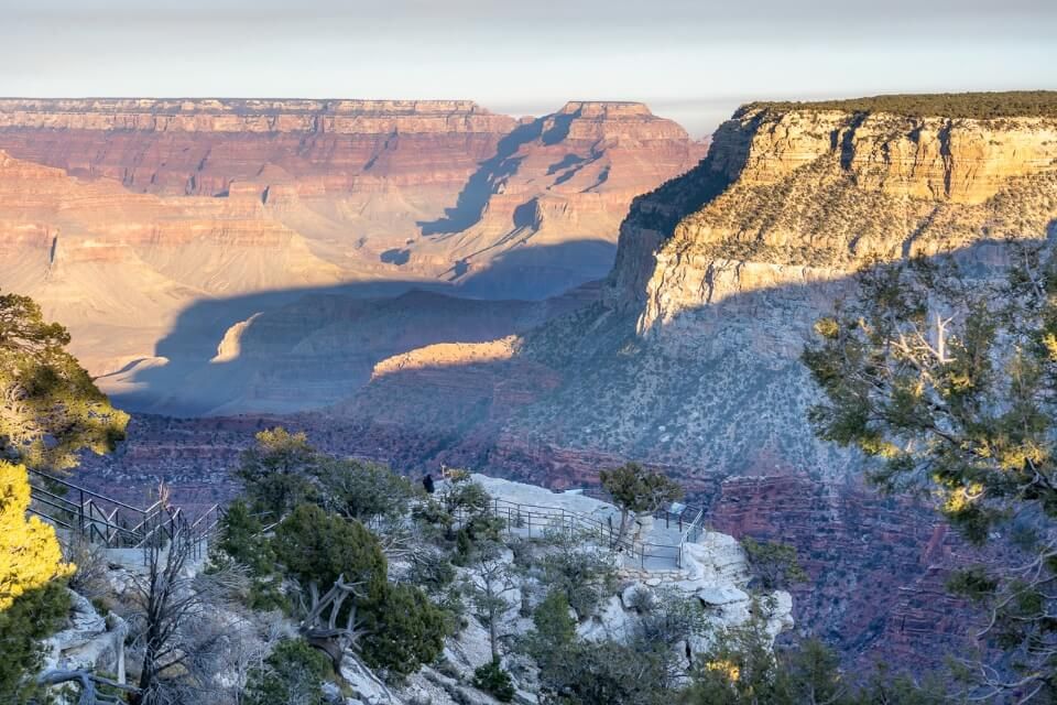 Trailview overlook in shadows late afternoon contrasting on rocks