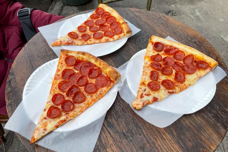 Three slices of delicious NYC pepperoni pizza